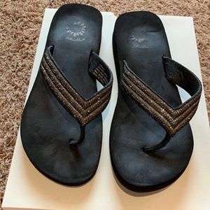 Yellow box flip flops
